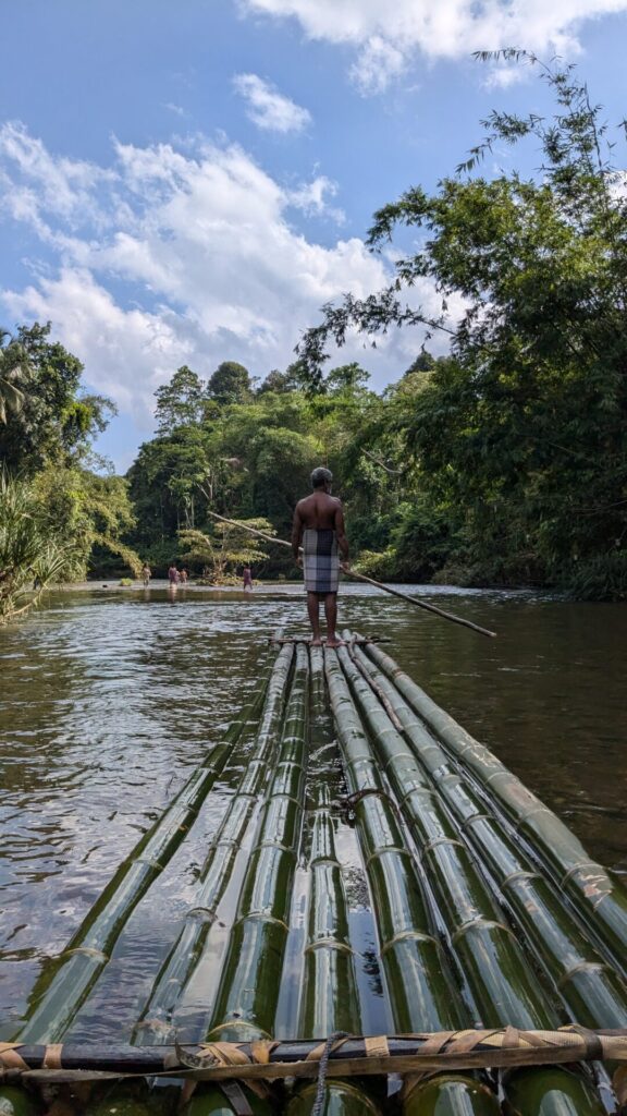 Bamboo rafting in Bopath ella water fall Sri Lanka